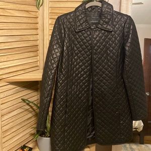 Black Leather trench coat. Leather collection by Neiman Marcus